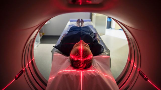 An individual having an MRI.