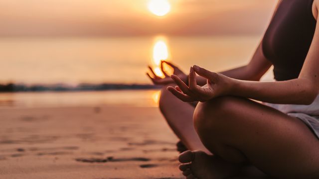 A person meditating.